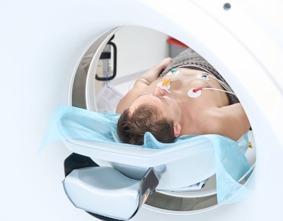 Patient is undergoing contrast-enhanced ECG-gated coronary CT angiography